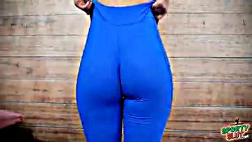 Huge, natural breasts and cameltoe on display during workout