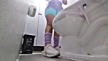 A gym chick pees in a public bathroom for me