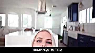 Mature woman gets fingered in the kitchen