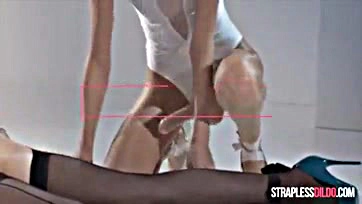 Two ballerinas enjoy strapless dildo fun