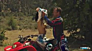 Motorcross legend gives brunette a dirty, explicit massage