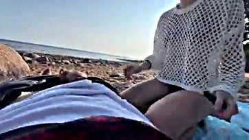 Beachgoers stunned by couple's explicit public sex romp