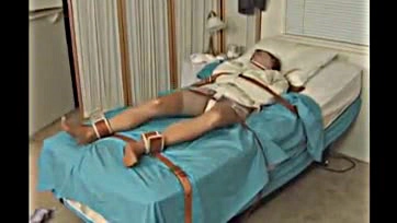 Fucked-up chick gets hogtied in a hospital bed