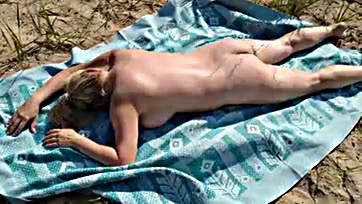 Man jerks off near nude beach, massive cum shot