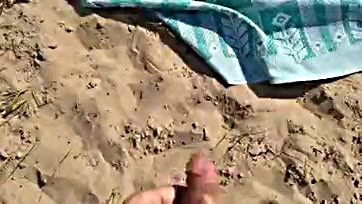 Man jerks off near nude beach, massive cum shot