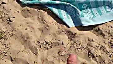 Man jerks off near nude beach, massive cum shot