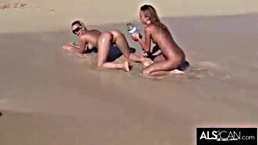 Lesbians engage in explicit, rough sex on public beach