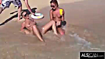 Lesbians engage in explicit, rough sex on public beach