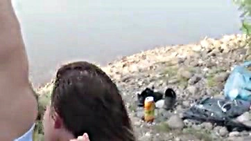 Girl publicly sucks dude on beach, gets nasty