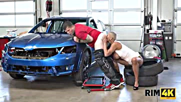 A hot woman has sex with a worn-out mechanic