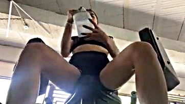 Fitness chick gets freaky in the gym bathroom quietly