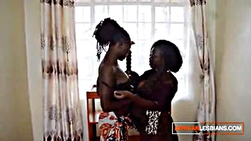 African lesbians share dildo in lesbian double penetration