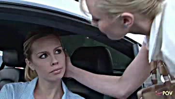 Lesbians console each other in a parking lot