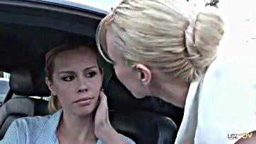 Lesbians console each other in a parking lot