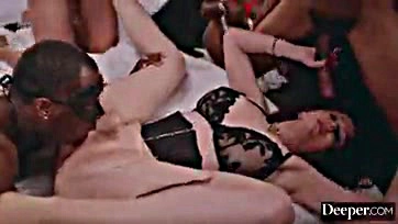 Explicit sex scene features multiple partners and explicit content