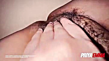 Priya fingers her wet hairy pussy alone at home