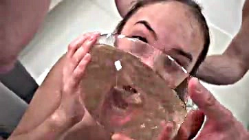 Mia Grandy drinks piss from two big cocks