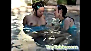 Lesbians swim, lick pussy poolside