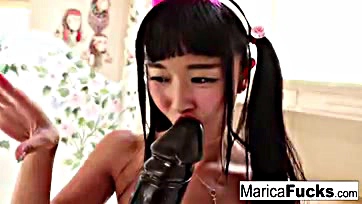 Japanese adult actress Marica Hase handles massive sex doll