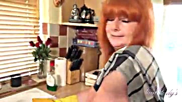 Mature redhead Melanie gets off on kitchen solo play