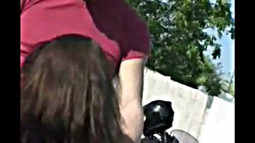 Sexy brunette gets cummed on by a biker