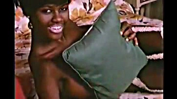 A hot black woman shows her naked vulva