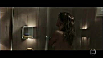 Julia flashes her tits in a shower scene