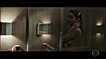 Julia flashes her tits in a shower scene