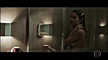 Julia flashes her tits in a shower scene