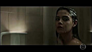 Julia flashes her tits in a shower scene