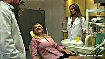 Lesbians engage in lesbian sex in a doctor's office