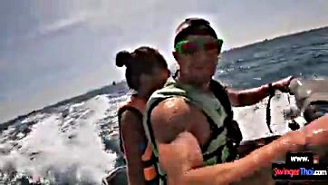 Girlfriend blows dude on jet ski, gets wild