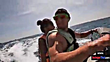 Girlfriend blows dude on jet ski, gets wild