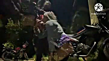 Two bikers disrespectfully cooking in a street kitchen