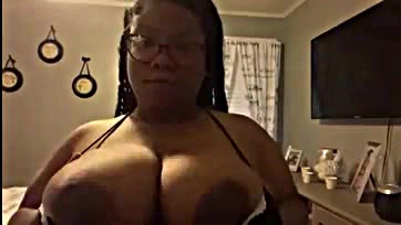 Sexy ebony milf gets her big tits off