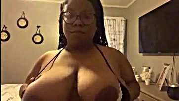 Sexy ebony milf gets her big tits off