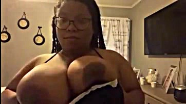 Sexy ebony milf gets her big tits off