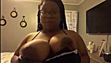 Sexy ebony milf gets her big tits off