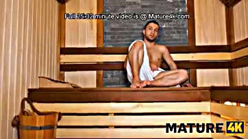 Older woman has sex with man in sauna