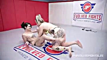 Lesbians engage in explicit, strap-on sex-filled wrestling