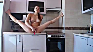 Teen plays with toys, gets off in the kitchen