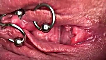 Pierced clitoris gets wet, pee goes in pussy