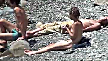 Naked teen naturists frolic in oceanic waters