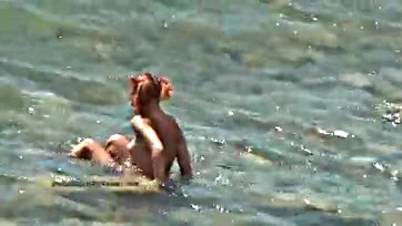 Naked teen naturists frolic in oceanic waters