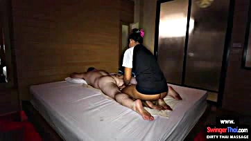 Asian masseuse gets client off with expert touch