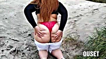 Hot chick's ass is ridiculously hard on the beach