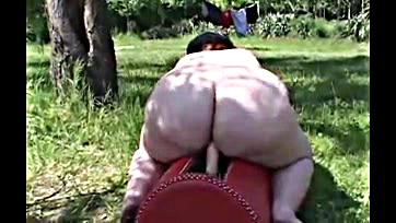 Fat woman has sex on Sybian and outside