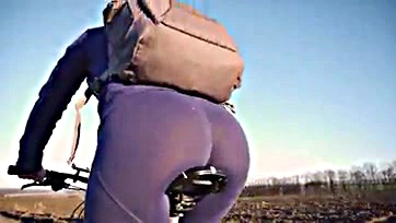 Sexy milf flaunts big booty on bike ride