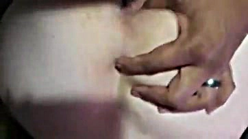 Kitty fingers master's cock while fingering herself