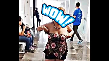 Laurita flaunts her tits on public street